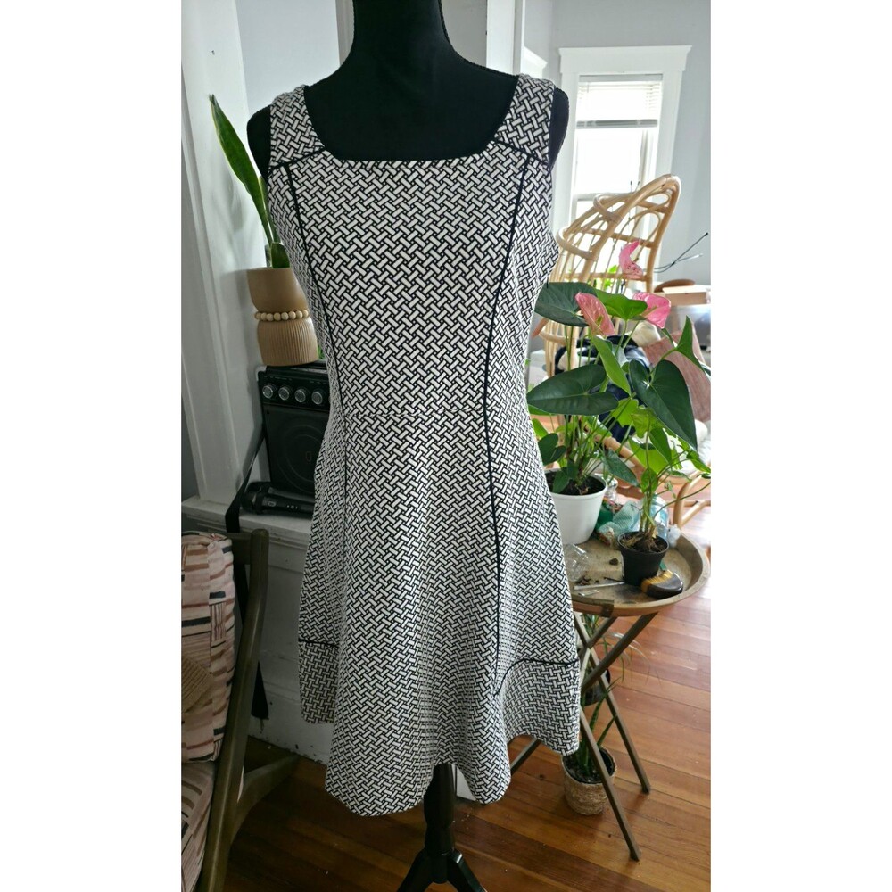 Lands' End dress  flattering fit, flare style sleeveless design and knee-length